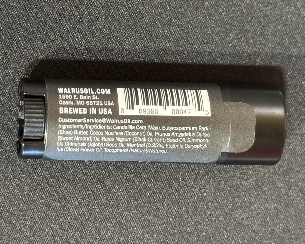 Walrus Oil Logger's Lip Balm application close-up on lips demonstrating non-greasy comfort benefit