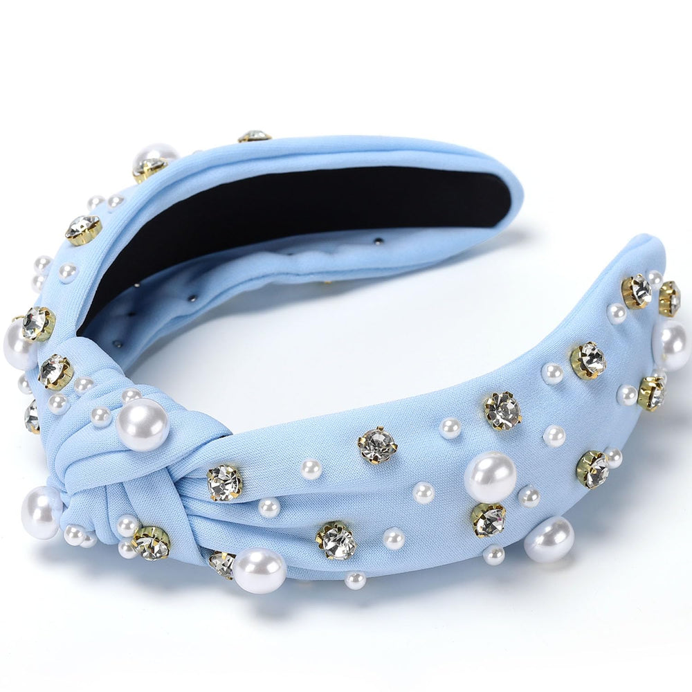WantGor close-up of faux pearls and rhinestones detailing for refined sparkle