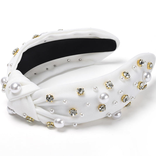 WantGor close-up of pearls and rhinestones highlighting craftsmanship