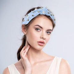 WantGor headband worn with an updo demonstrating formal styling versatility