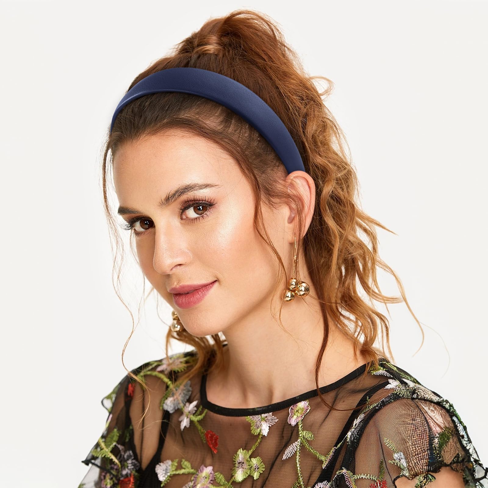 WantGor headband held in hand to show true size and portability
