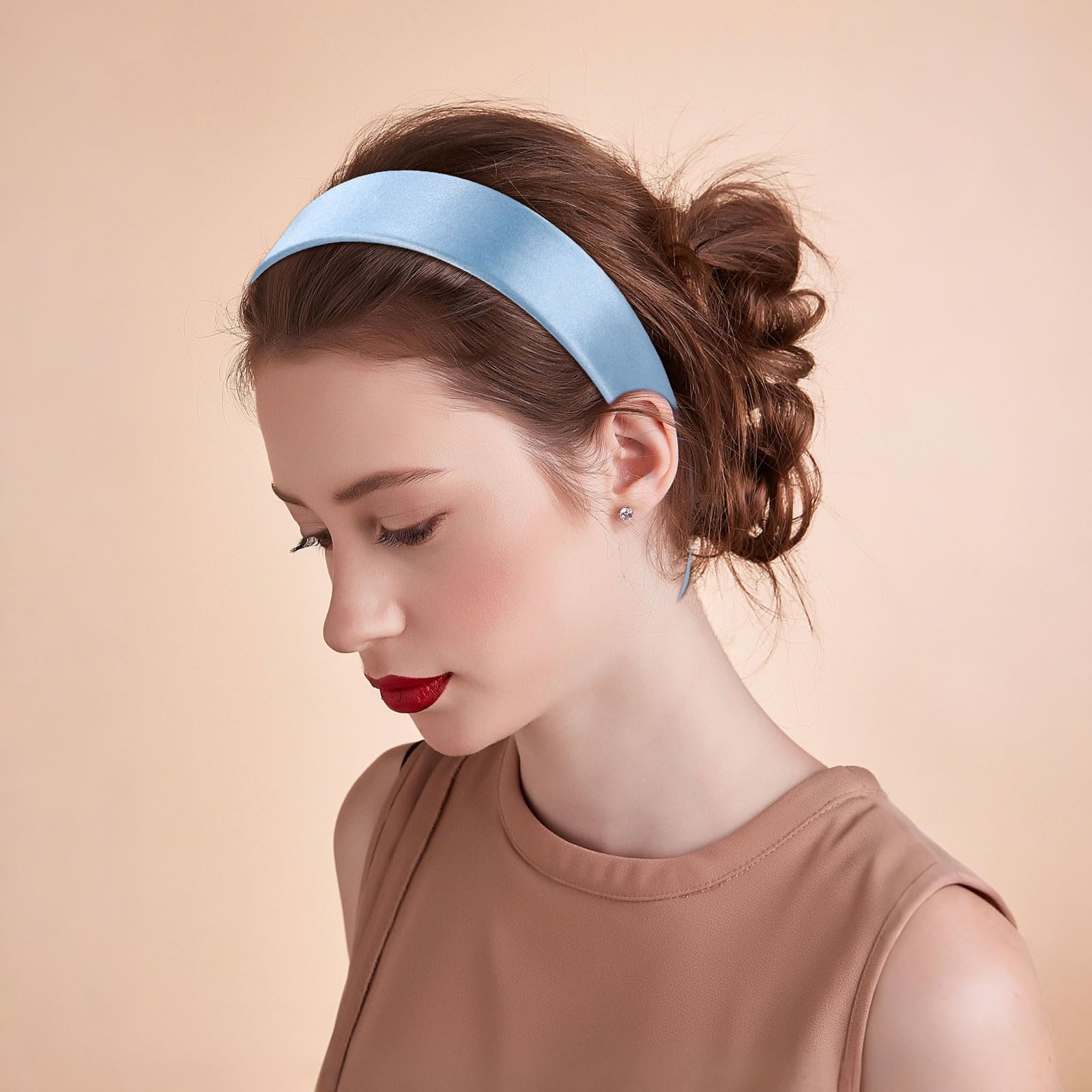 WantGor headband held in hand to show large 1.6-inch width and scale