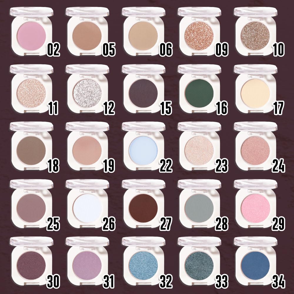 WanTuoluo swatch on brush showing holographic plum payoff and buildability