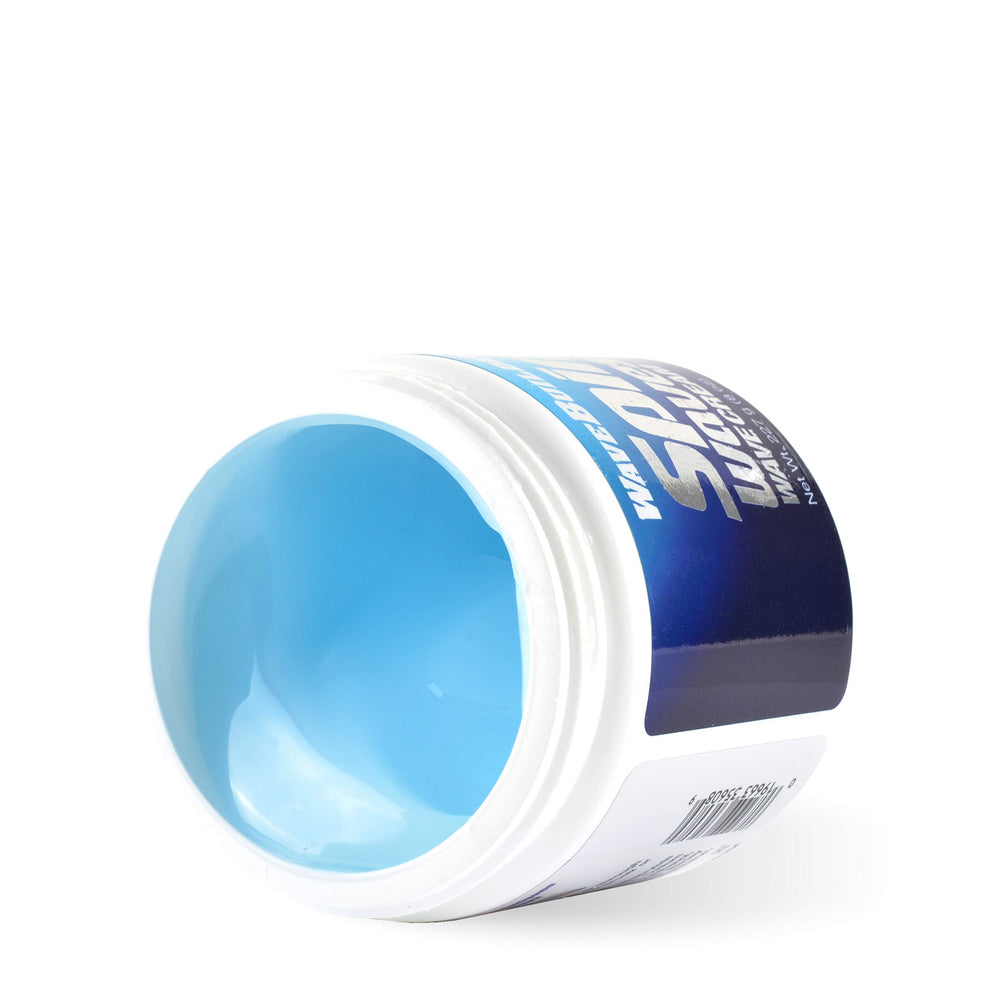 WAVEBUILDER Spin'n Waves cream on fingers close-up showing smooth texture for easy application and shine