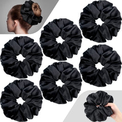 Waydress front view of six black oversized satin scrunchies shows glossy finish and plush volume