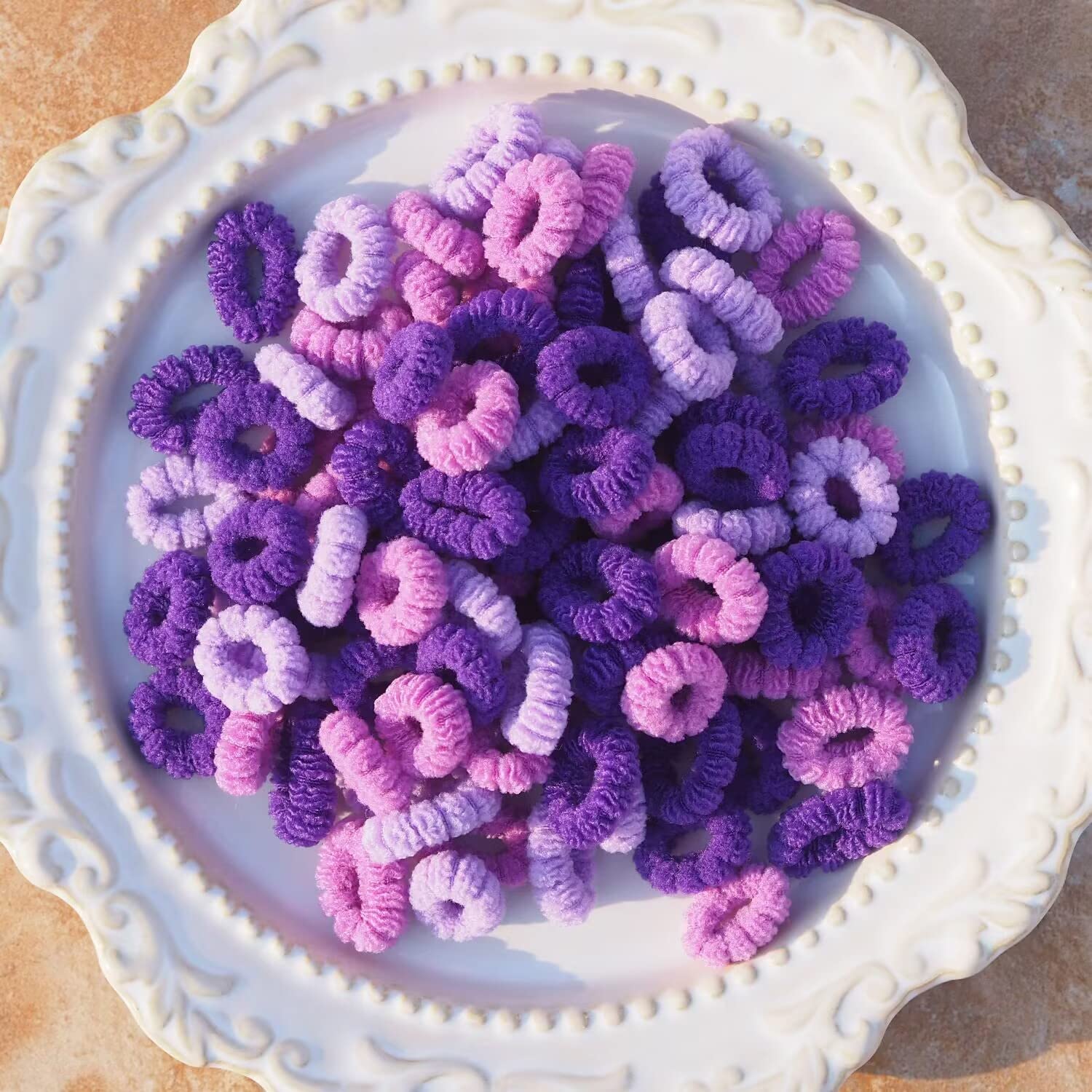 WDGROW assorted color spread of small hair elastics adding playful style benefit