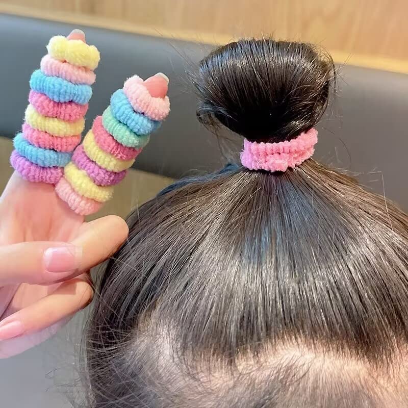 WDGROW mini hair tie next to a coin showing the 2cm small size