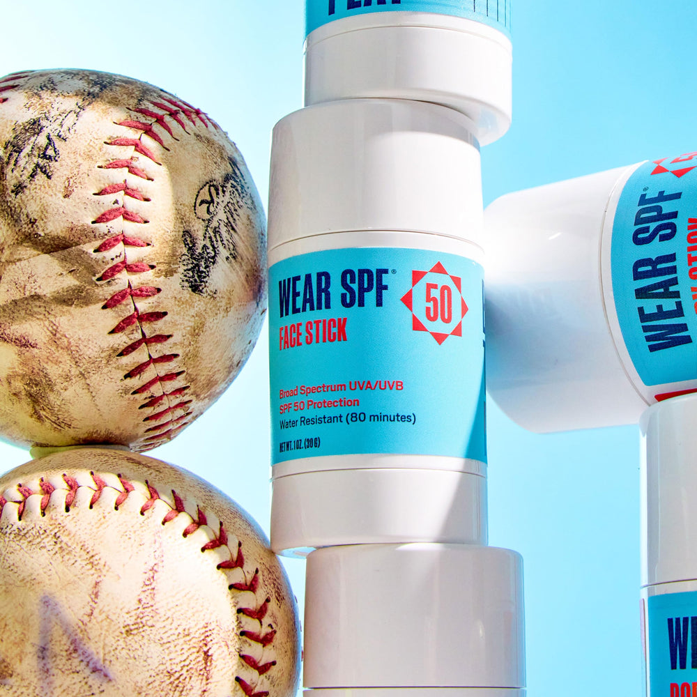 WearSPF next to water bottle showing sweat and water-resistant advantage