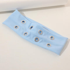 Weazppre headband beside ruler showing scale and true-to-size fit benefit