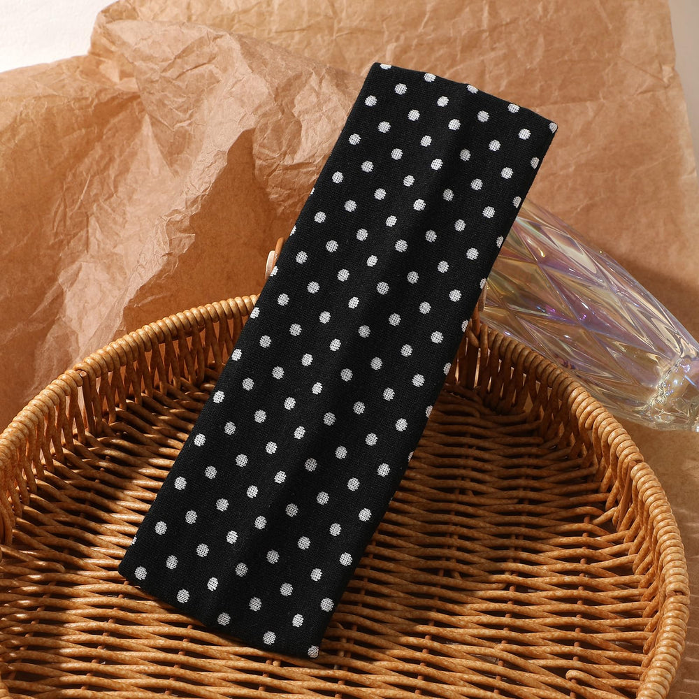 Weazppre headband held in hand demonstrating size and stretch