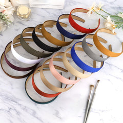 Wecoe headbands flatlay paired with outfit pieces to inspire styling ideas