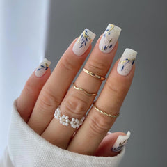 WEIXIWUYU front packaging showing 24-piece press-on nail kit with tools, easy at-home use