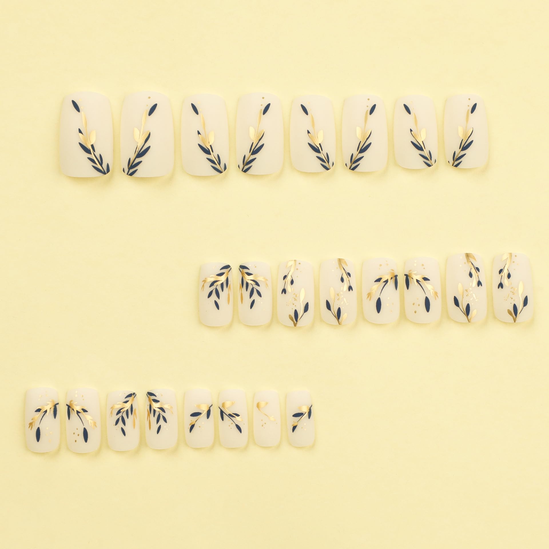 WEIXIWUYU nails worn on hand showing blue leaf design and polished look for events