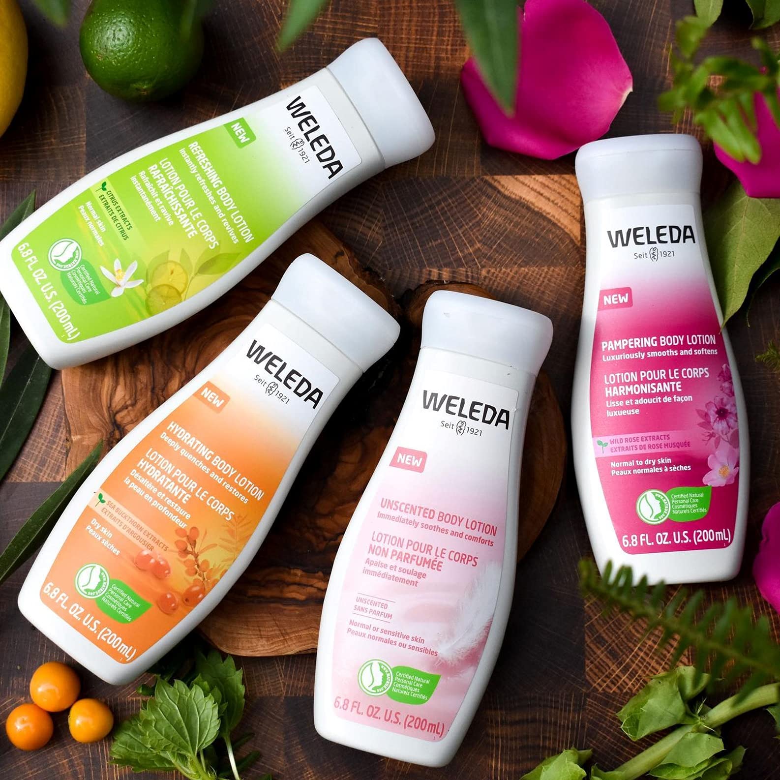Weleda bottle in hand for scale showing compact travel-friendly size