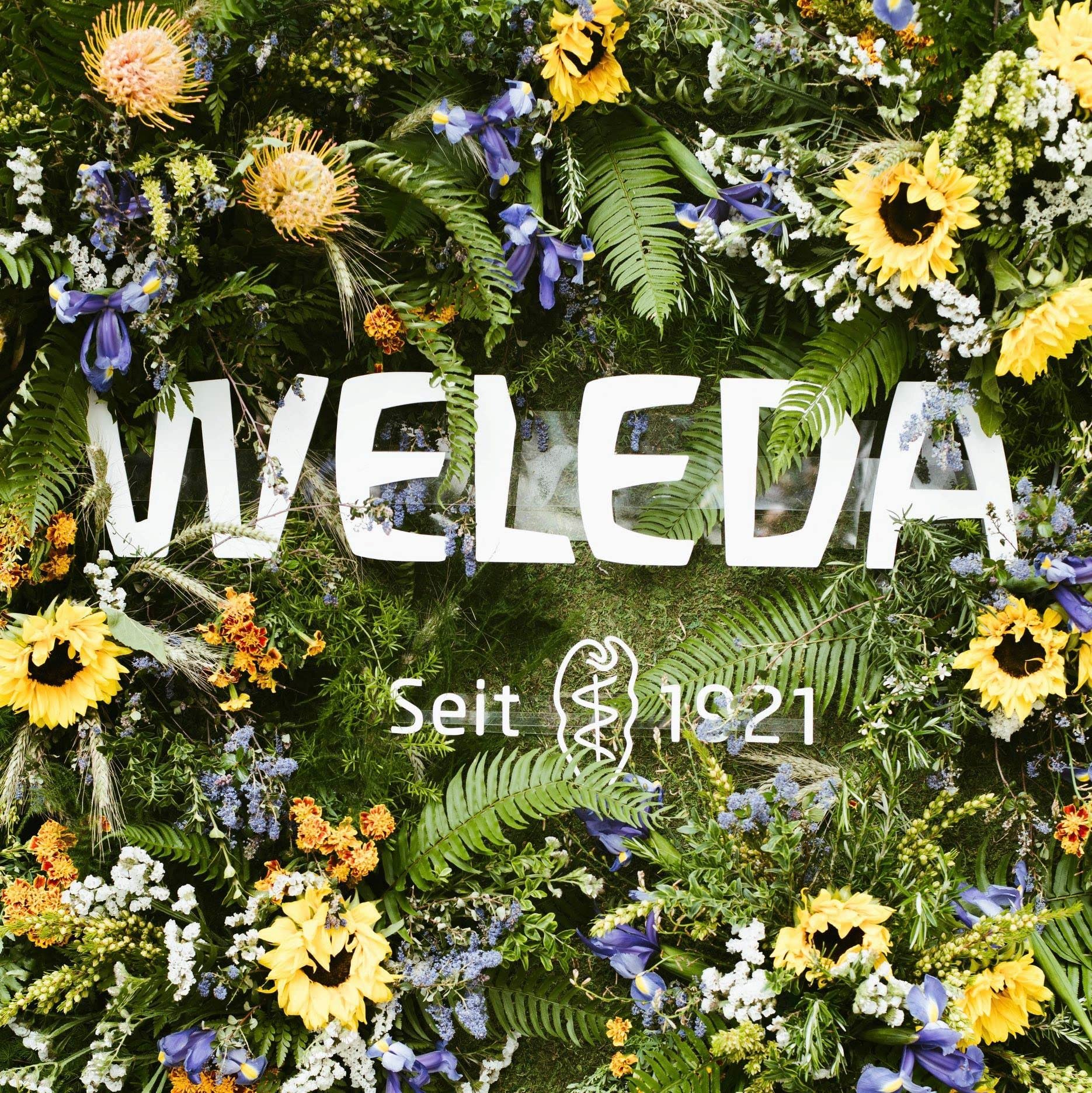 Weleda bottle in a shower setting illustrating calming aroma and everyday use