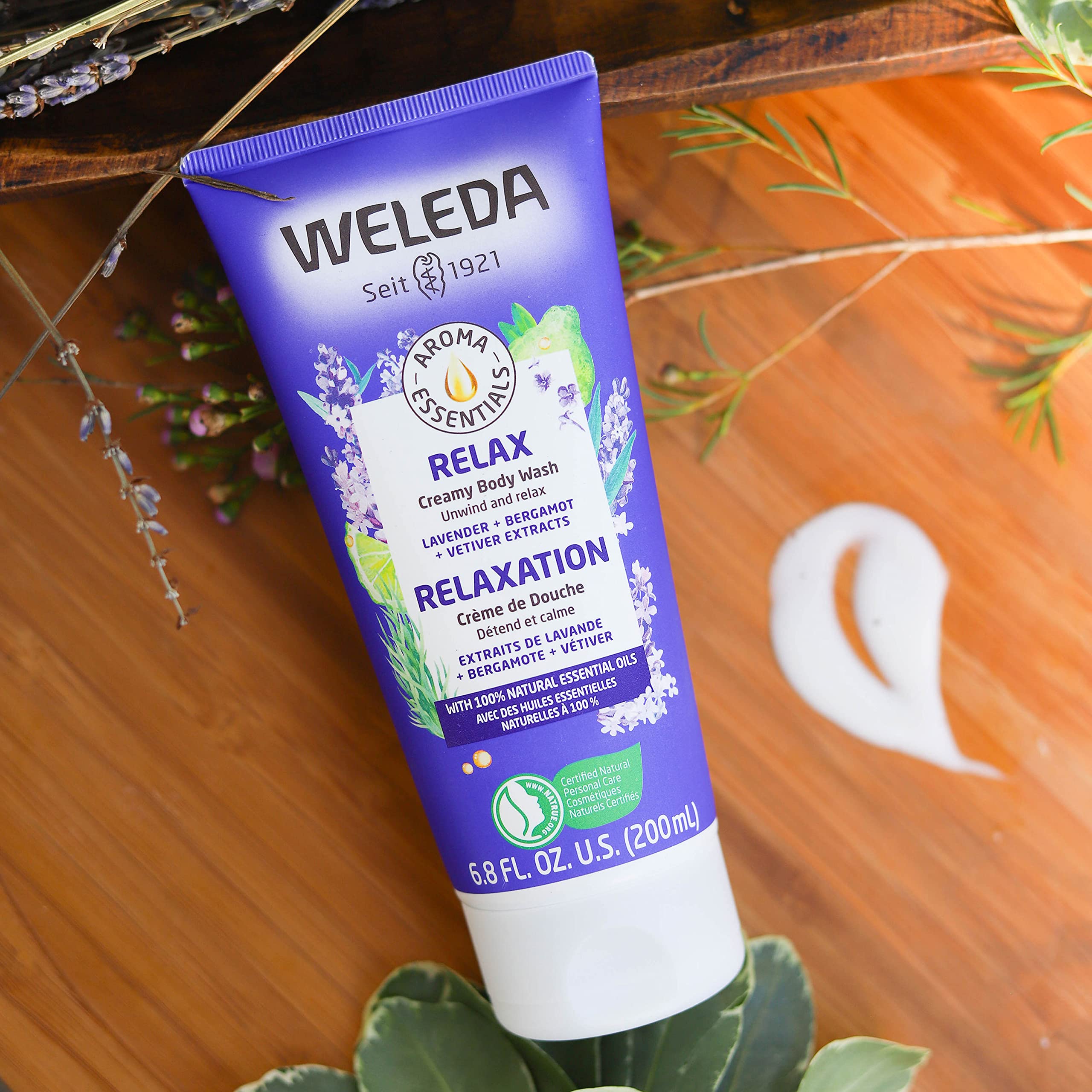 Weleda Relax placed in a travel bag to highlight compact 6.8 fl oz convenience