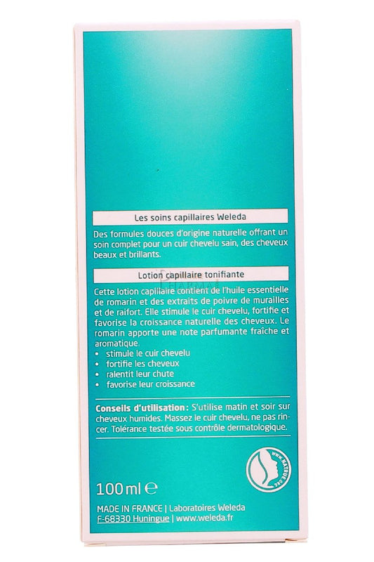 Weleda rosemary hair tonic dropper applying tonic to scalp for targeted revitalising benefit