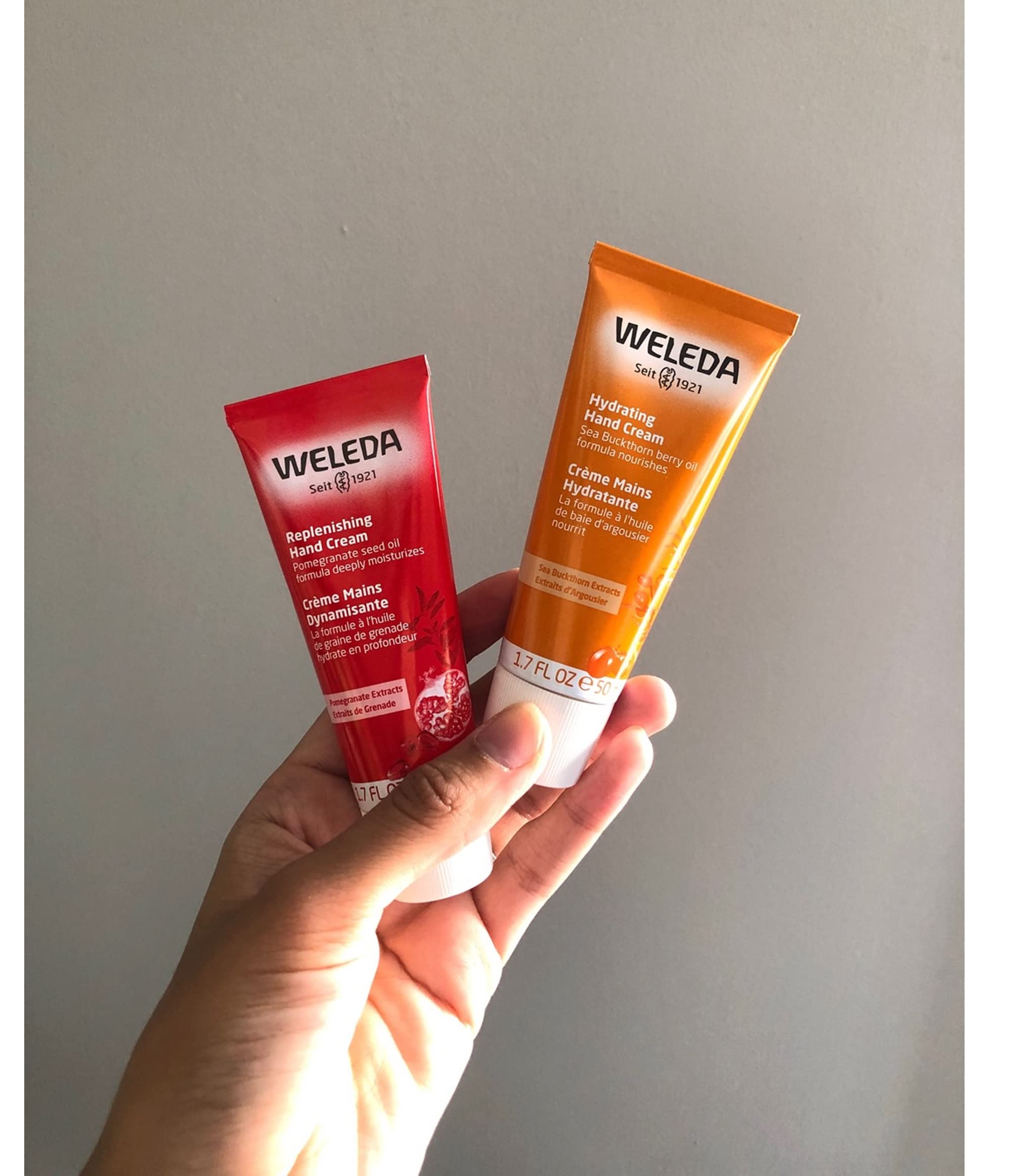 Weleda Sea Buckthorn being massaged into hands for immediate softness
