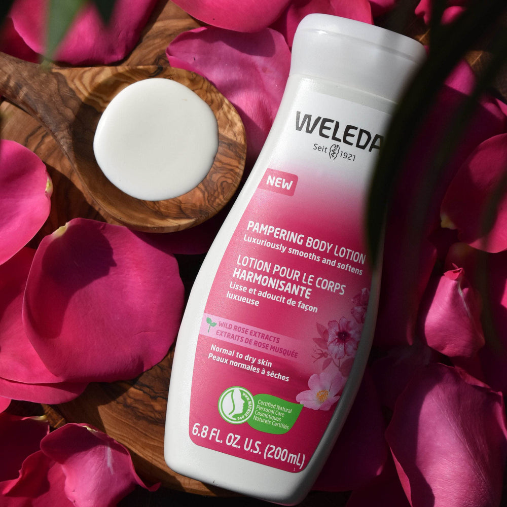 Weleda wild rose lotion texture closeup showing smooth non-greasy benefit