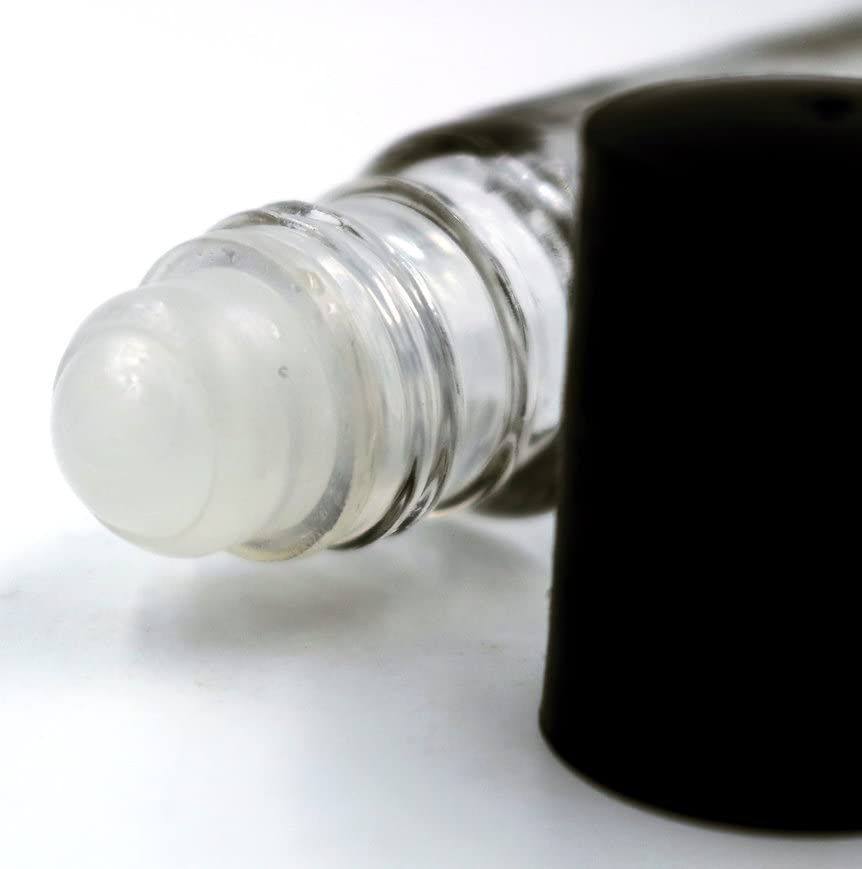 Well's Oil glass bottle texture highlighting quality materials and scent preservation