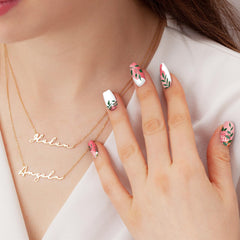 Whaline lifestyle shot of finished manicure showcasing salon-quality floral nail results