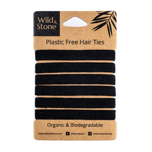 Wild & Stone front view of pack showing six black biodegradable hair bands, eco benefit