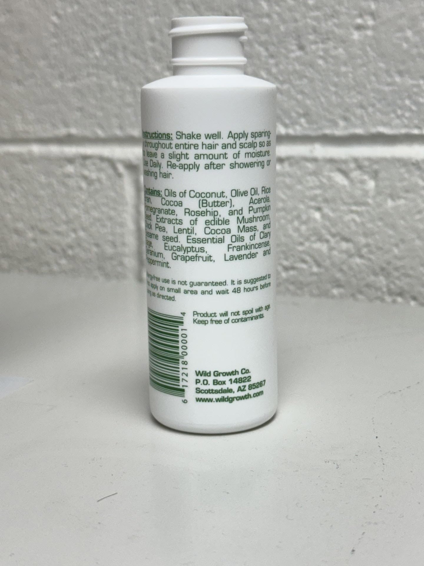 Wild Growth close-up of oil texture highlighting lightweight, non-greasy absorbency benefit
