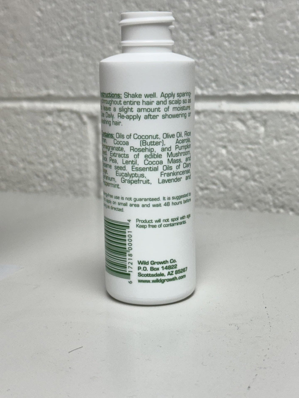 Wild Growth close-up of oil texture highlighting lightweight, non-greasy absorbency benefit