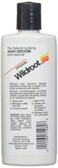 Wildroot jar open with product on fingers demonstrating smooth spreadable texture