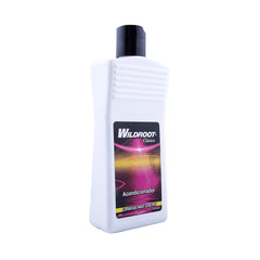 Wild Root conditioner texture pouring from bottle highlighting smooth moisturizing benefits