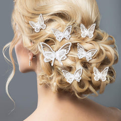 WILLBOND clustered butterfly clips on an updo adding elegant dimension