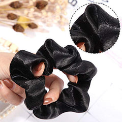 WILLBOND scrunchie holding a sleek ponytail demonstrating gentle grip and polished look