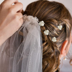 WILLBOND pins styled in bridal updo demonstrating added elegance benefit
