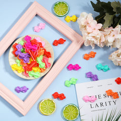 WILLBOND array of clips spread on table for party favors and crafts