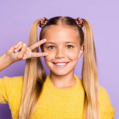 WILLBOND stacked scrunchies on wrist as decorative accessory and storage idea