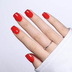 WiniBeauty front packaging displaying 30 classic red press-on nails and tools