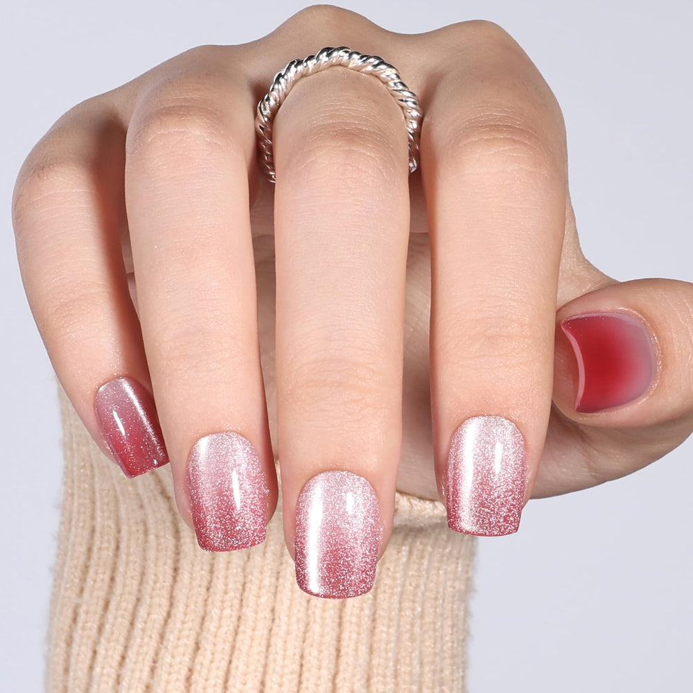 WiniBeauty nails beside a quarter for scale to help size choice and fit