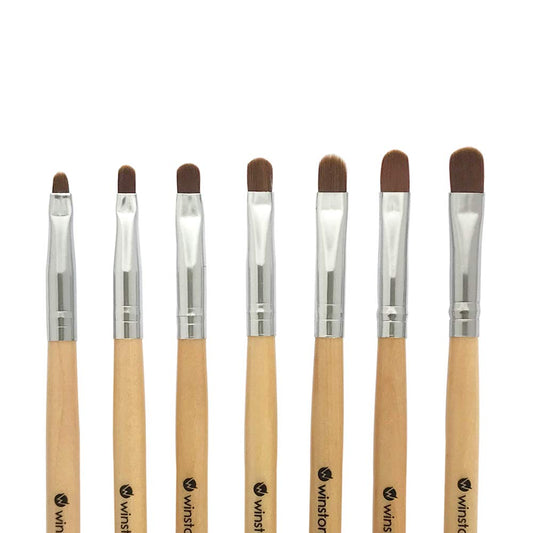 Winstonia front packaging showing seven wooden-handle brushes and benefits