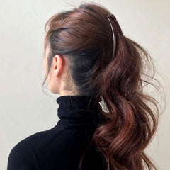 Winsyison clip securing a full French twist showing reliable hold for events