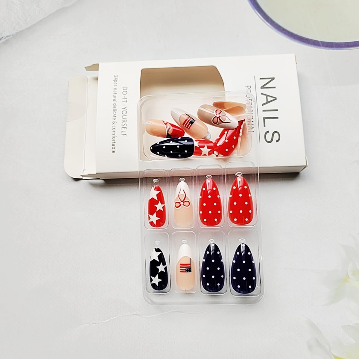 WLGDLH nails beside ruler for scale, helps choose correct size for fingers
