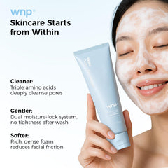 WNP model using cleanser at sink to show daily gentle cleansing routine