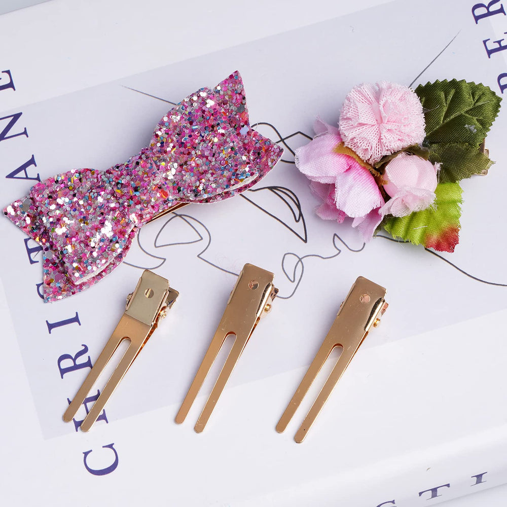 Wobe clips with attached bows demonstrating DIY accessory potential