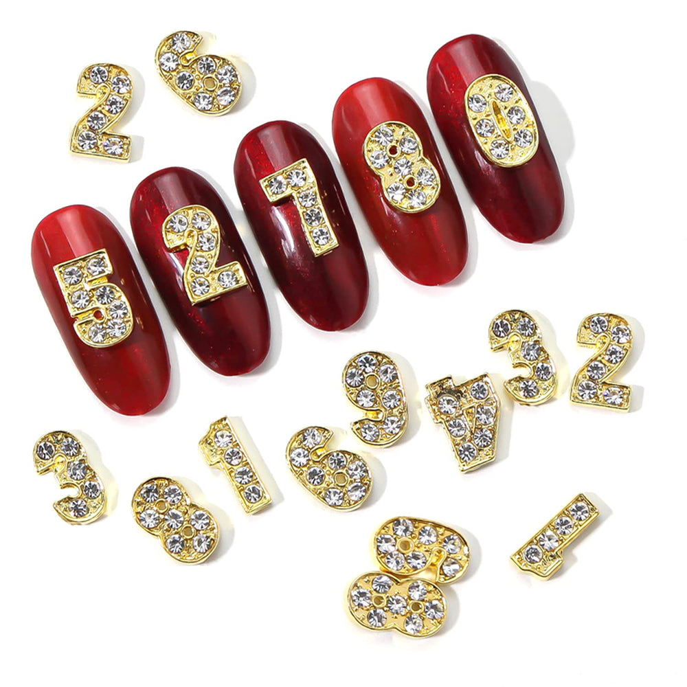 WOKOTO close-up of rhinestone detail on a gold number charm highlighting sparkle