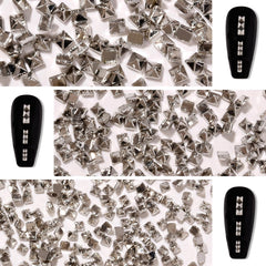 WOKOTO studs applied on acrylic nail showing edgy metallic finish