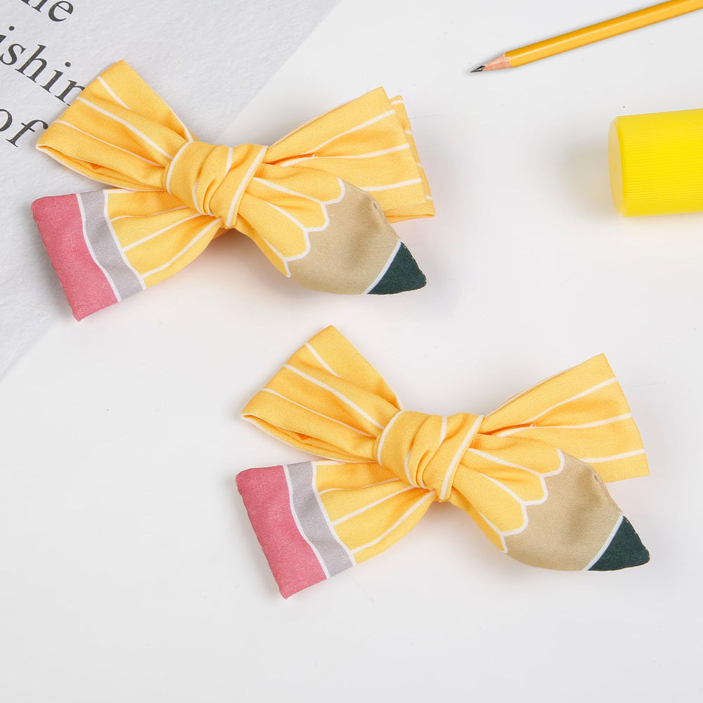WOVOWOVO pencil clip worn in ponytail demonstrating secure hold