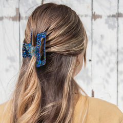 WOVOWOVO side profile showing open jaw and teeth, strong non-slip grip for thick hair