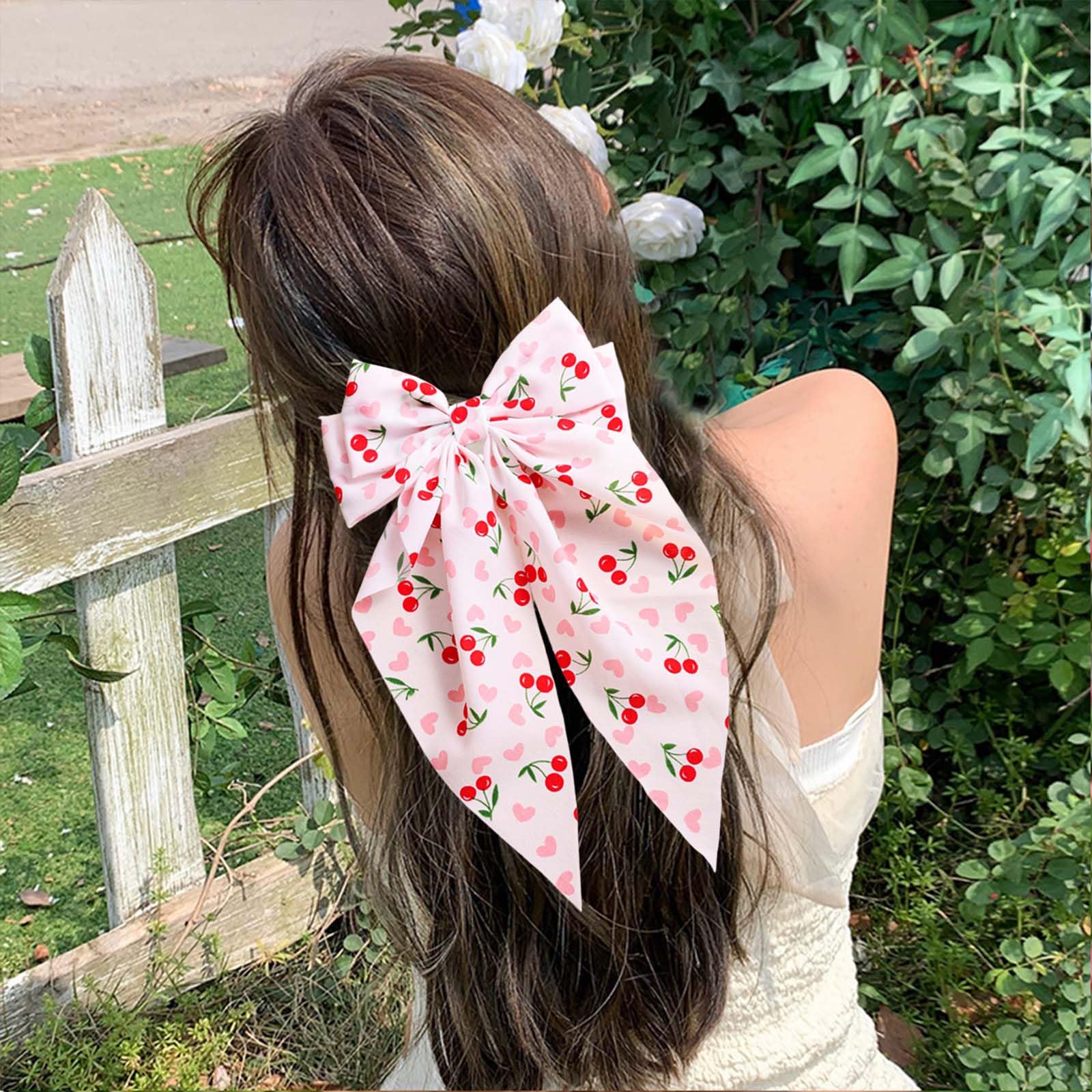 WRBAJIS cherry bow half-up hairstyle demonstrates romantic, wearable look