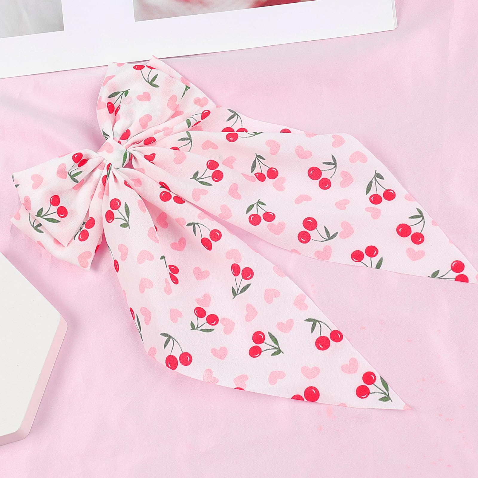 WRBAJIS cherry bow lifestyle party setting suggests festive, coordinated accessorizing