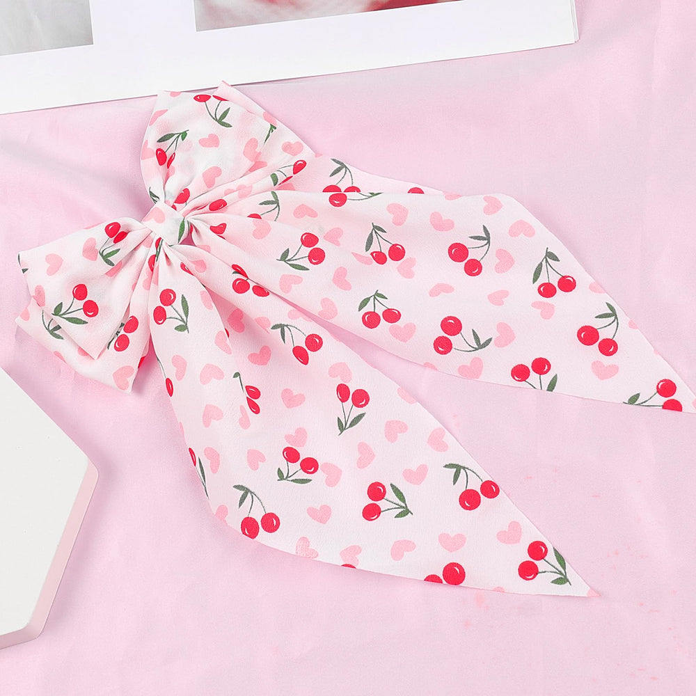 WRBAJIS cherry bow lifestyle party setting suggests festive, coordinated accessorizing