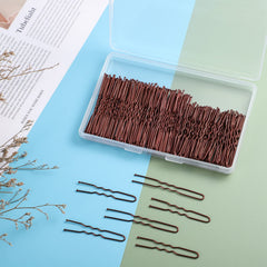 WSICSE pins securing a bun in a model's hair demonstrating discreet, long-lasting hold